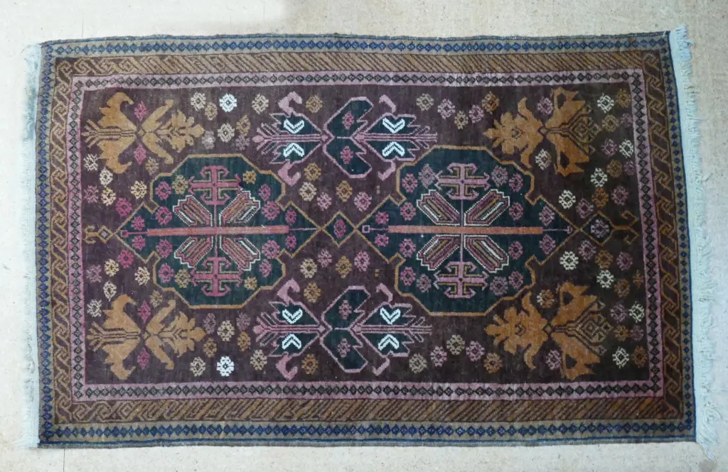 A small hand knotted Baluchi rug Image 1++