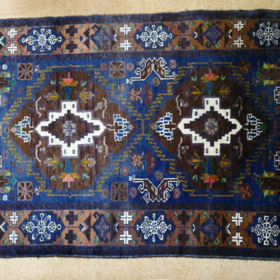A Persian Shiraz hand knotted rug