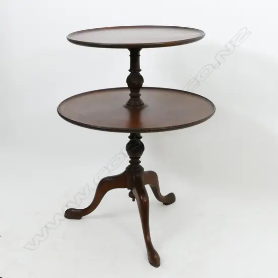 A 19thC mahogany Georgian Revival two-stage circular dumb waiter