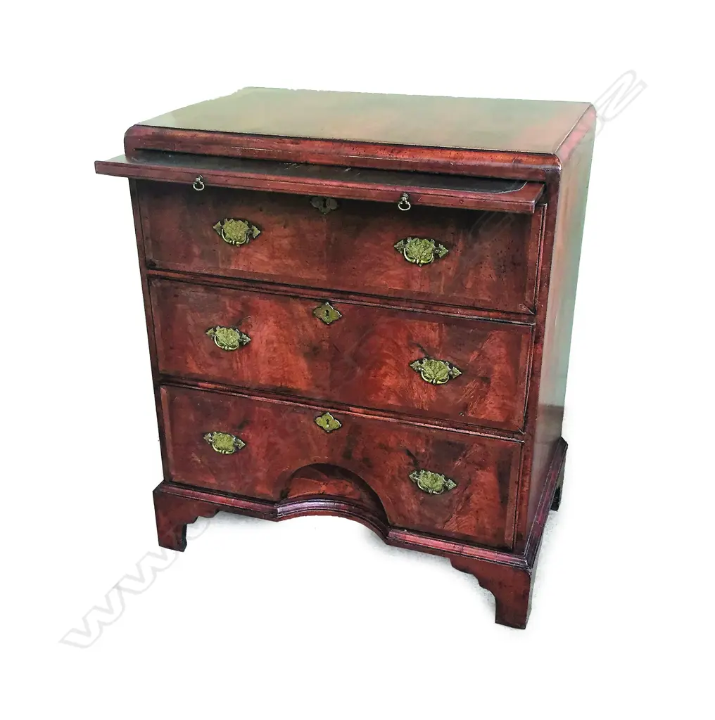 An old walnut small proportioned three drawer chest Image 1++
