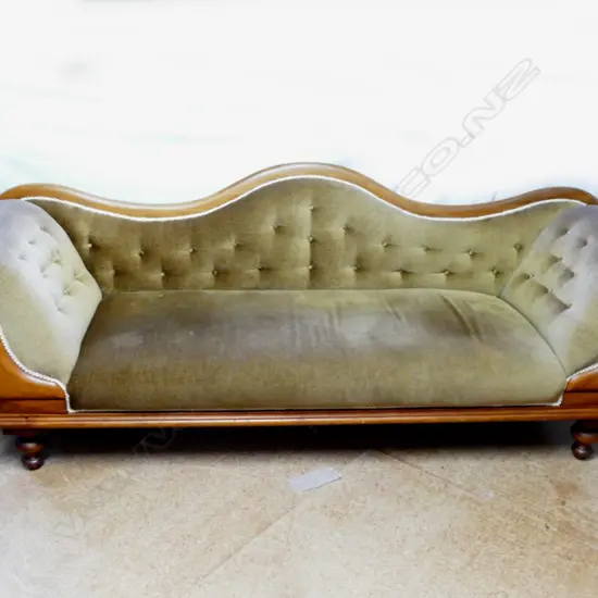 A New Zealand colonial rimu double ended roll-arm settee