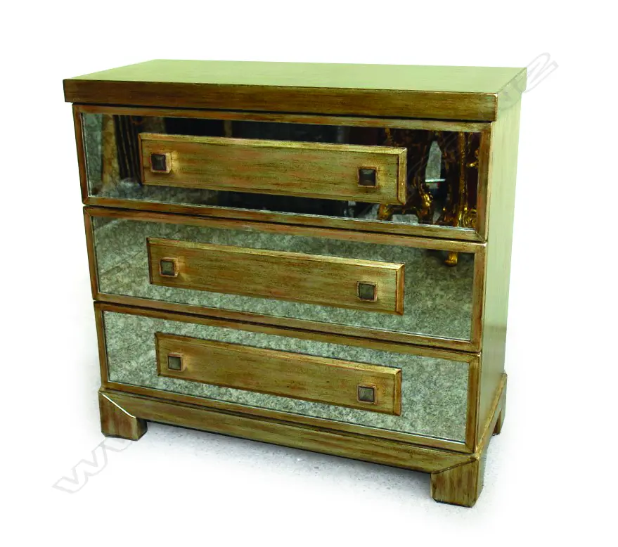 A contemporary designer gilt and mirrored three-drawer commode Image 1++