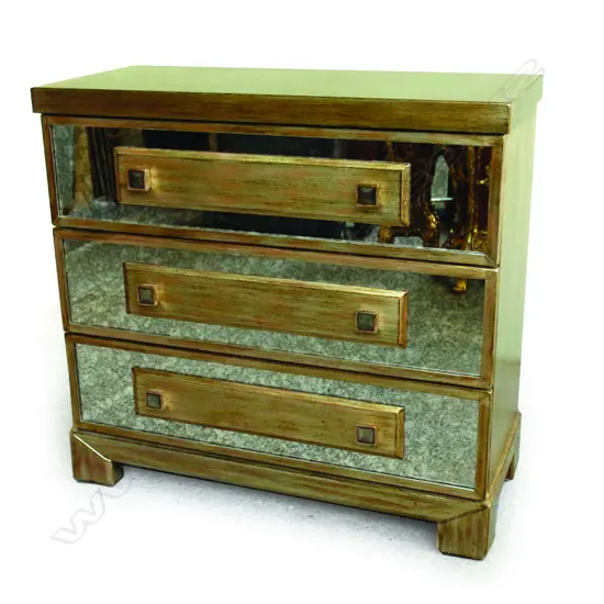A contemporary designer gilt and mirrored three-drawer commode