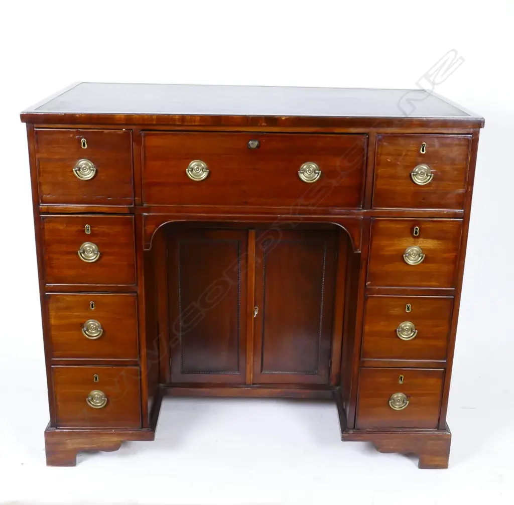 A mahogany Georgian Revival kneehole desk Image 1++