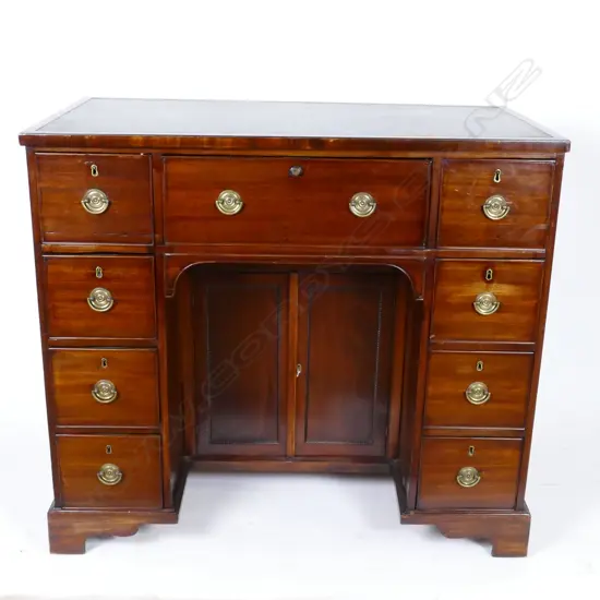 A mahogany Georgian Revival kneehole desk