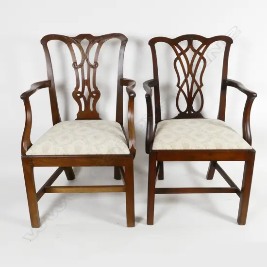 Two Edwardian mahogany Chippendale elbow chairs
