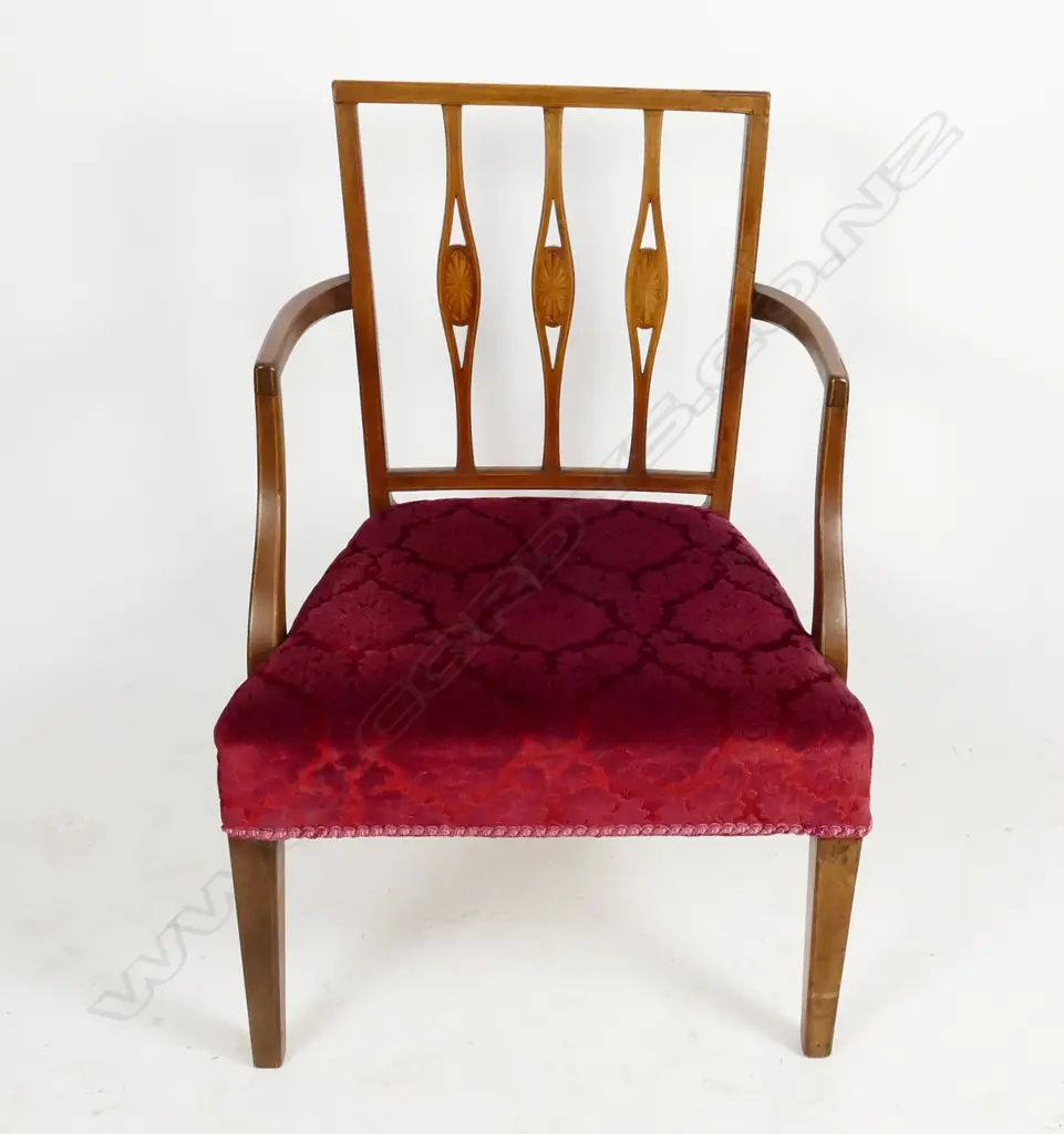 An Edwardian mahogany Sheraton Revival elbow chair Image 1++
