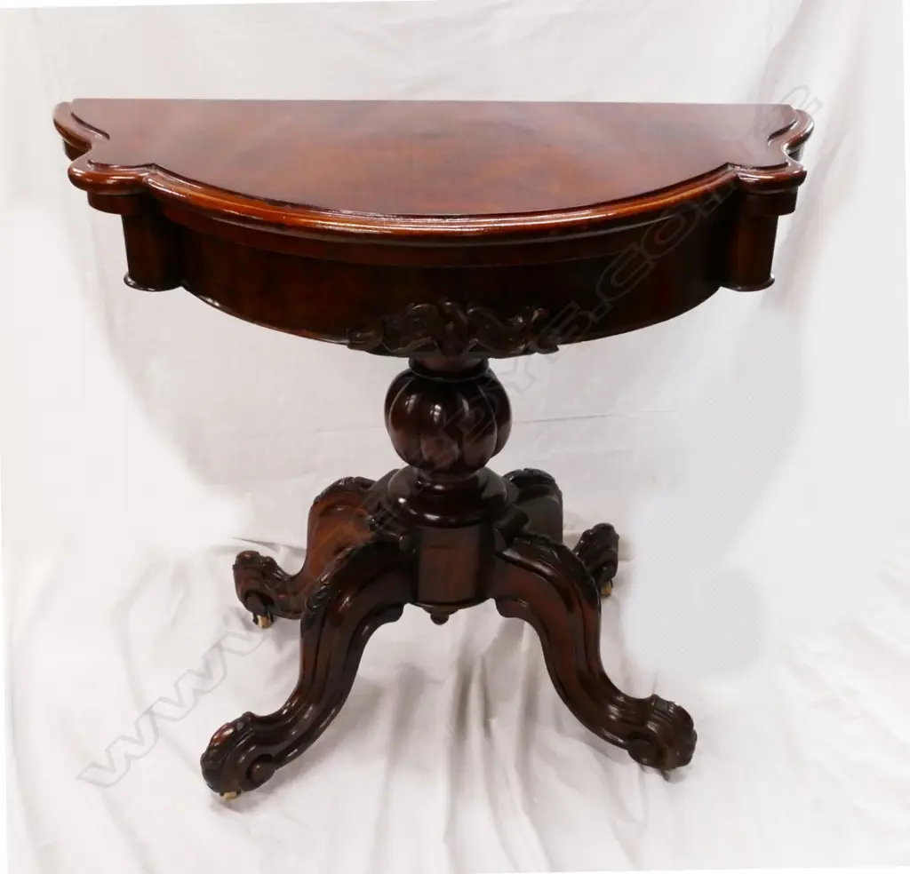 A Victorian walnut serpentine demi-lune fold-over card table Image 1++
