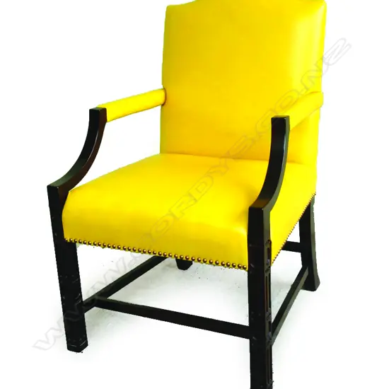 A pair of contemporary designer ebonised wood and mustard leather Gainsborough chairs