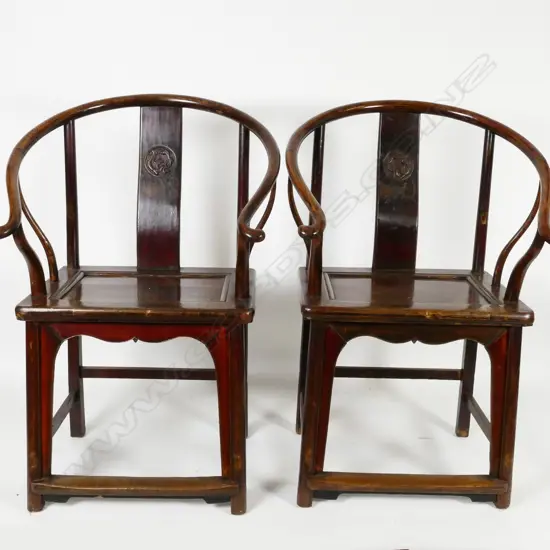 A pair of Chinese horse-shoe back Mandarin chairs