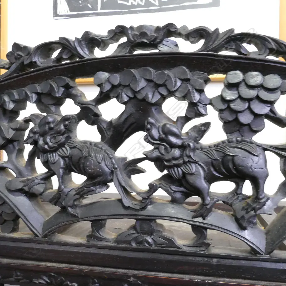 An ornate Chinese blackwood carved display cabinet Image 1++