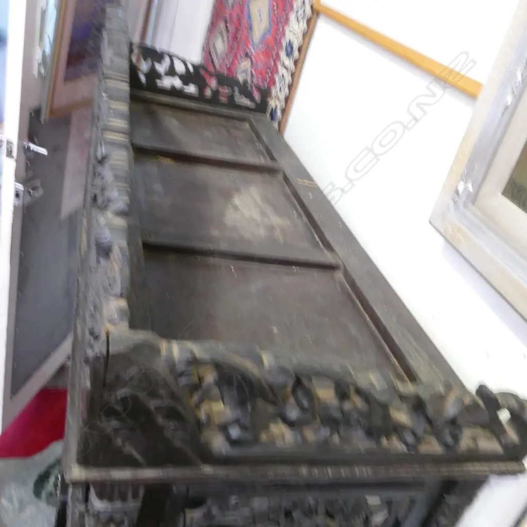 An ornate Chinese blackwood carved display cabinet Image 1++