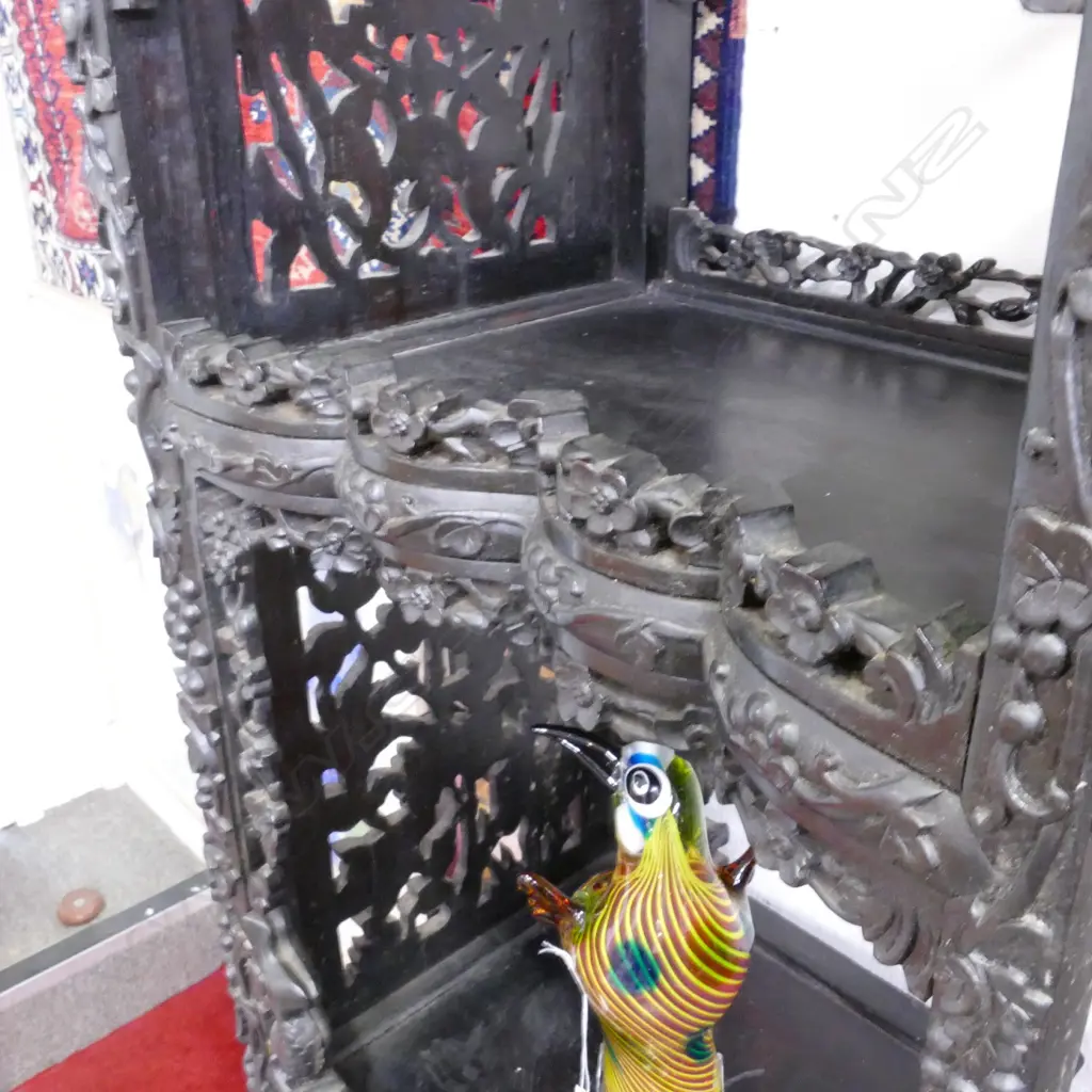An ornate Chinese blackwood carved display cabinet Image 1++