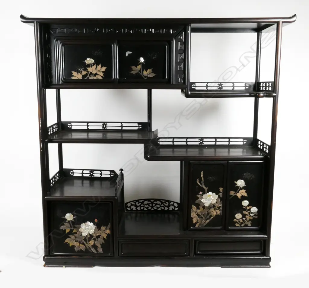 An old Chinese ebonised display cabinet with tiered galleried open shelves Image 1++