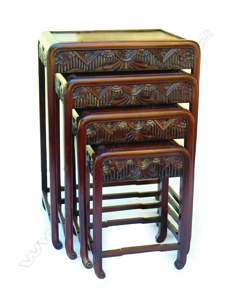 An Art Deco inspired nest of four Chinese teak tables Image 1++