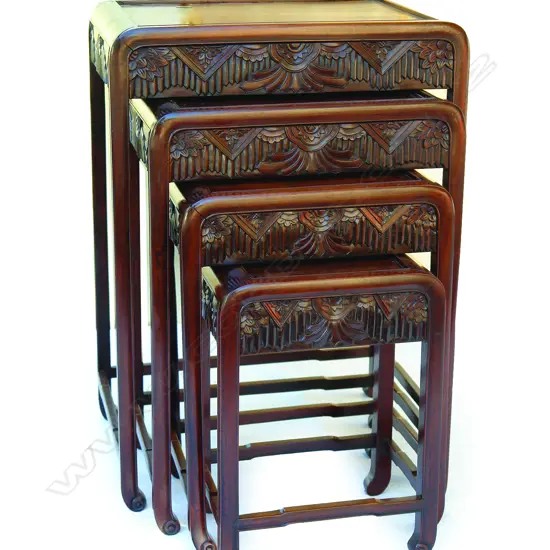 An Art Deco inspired nest of four Chinese teak tables