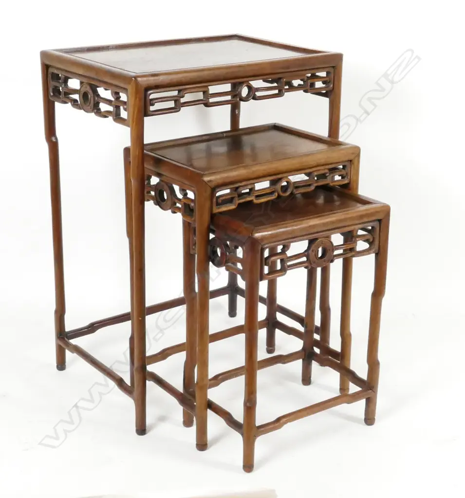 A nest of three Chinese hardwood side tables Image 1++