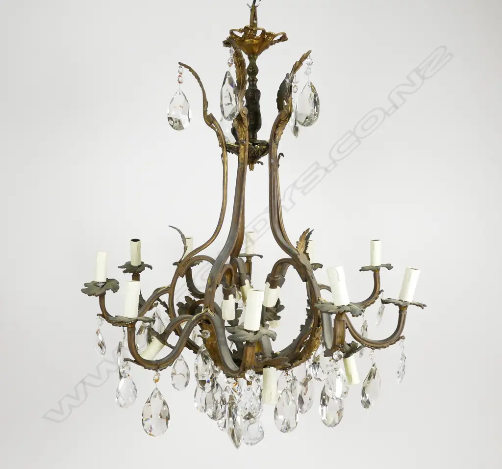 An antique French gilt metal chandelier Image 1++