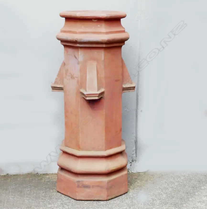An old terracotta octagonal form chimney pot Image 1++