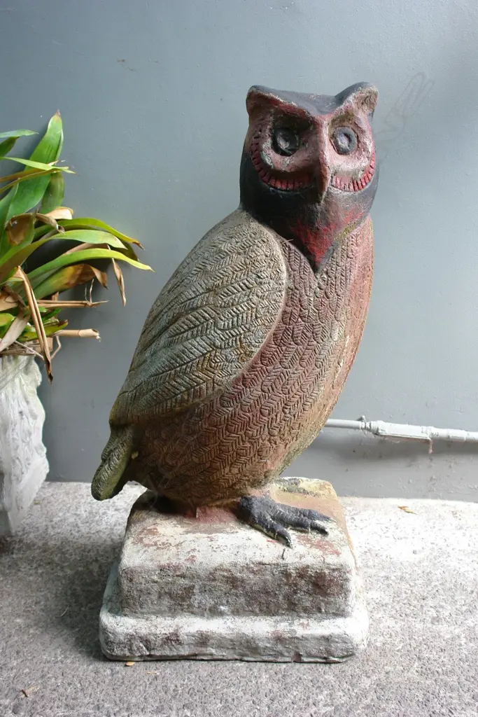 A large old concrete garden statue of an owl Image 1++